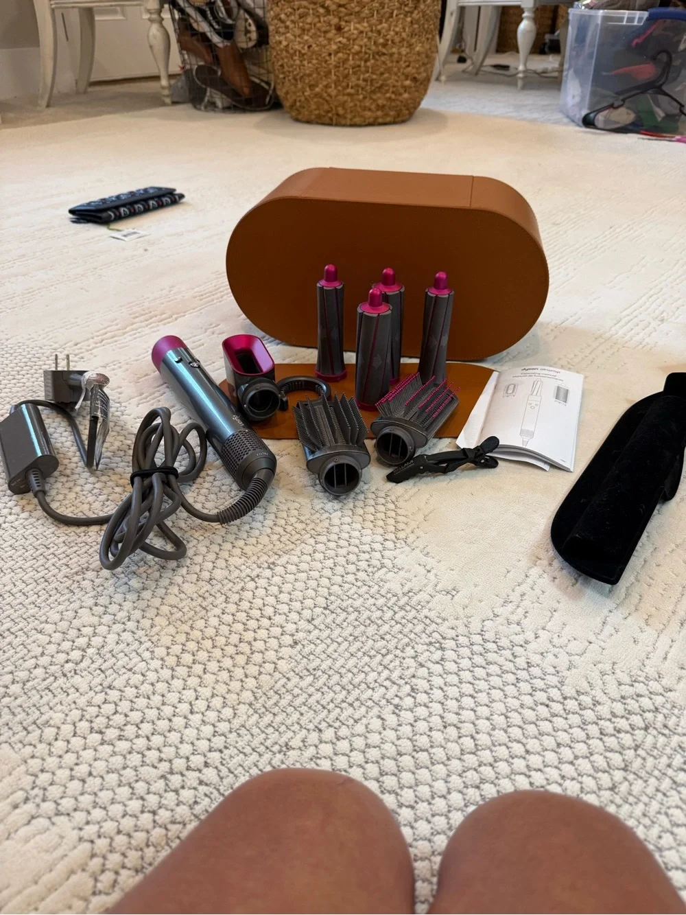 Dyson styling set in Pink and Gunmetal with Tan travel case